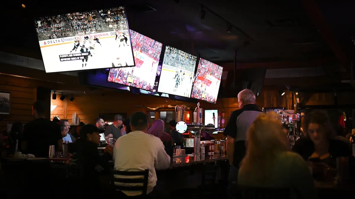 Sports bar TVs at Chill Bar & Grill in Lewisville, TX